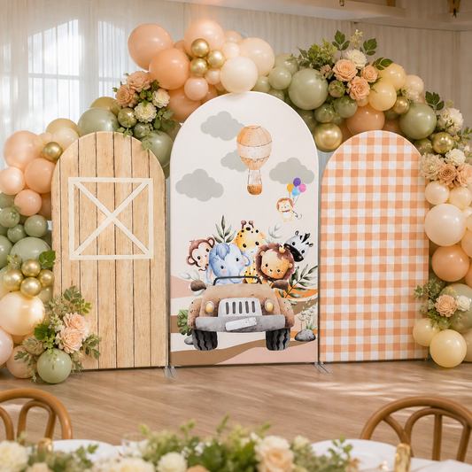 Event setup with safari animal arch backdrop and balloon garland