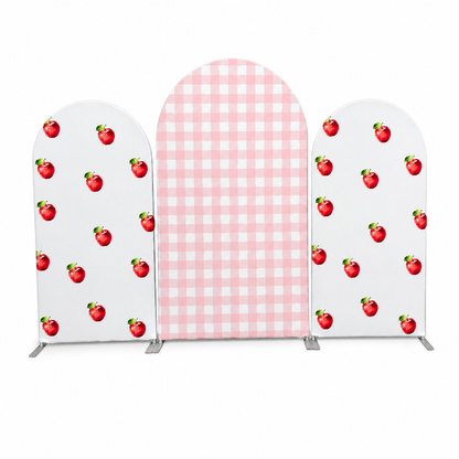 Front view pink checkered apple pattern party arch backdrop