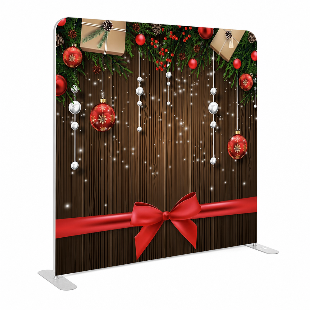 Photo backdrop decorations with Christmas ornaments and red bow