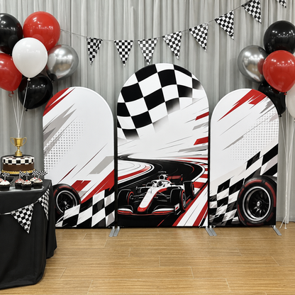 Decorated race car themed arch backdrop setup for a party