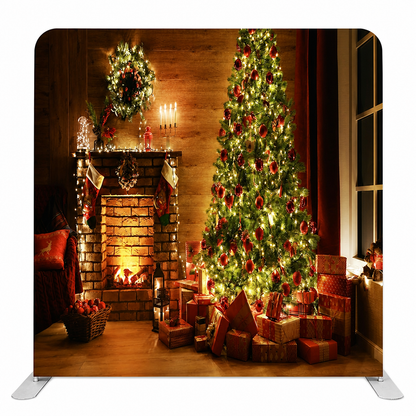 Christmas backdrop with glowing fireplace and decorated tree