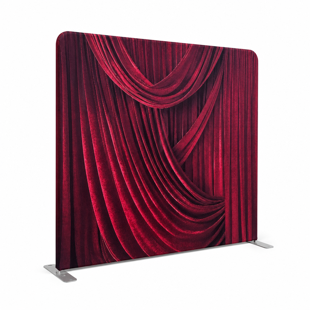 Angle view of velvet red draped curtain backdrop with aluminum stand