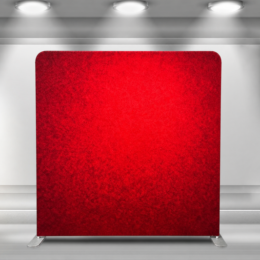 Red backdrop in modern indoor setting under ceiling lights