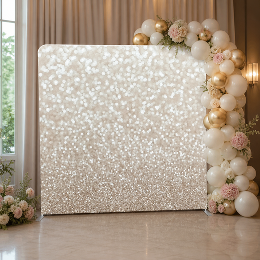 Gold glitter backdrop used for event decoration with balloon arch