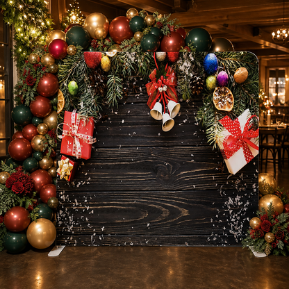 Christmas party setting with photo booth backdrop decorated with gifts and bells
