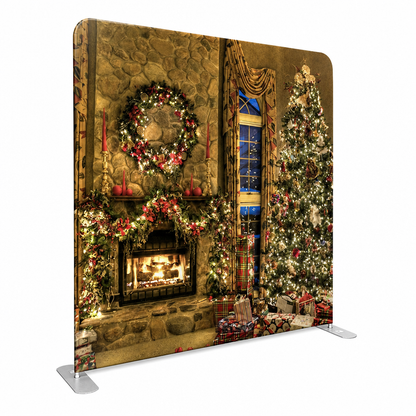 Tension fabric backdrop featuring decorated fireplace and Christmas tree