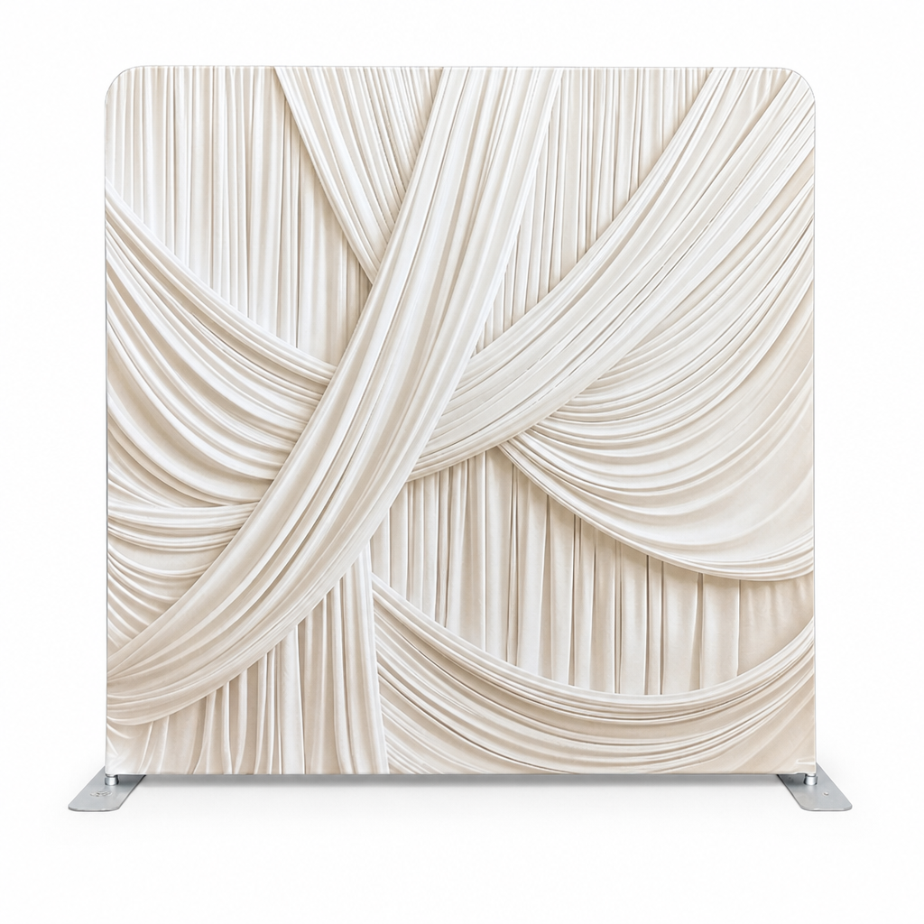 Ivory draped fabric photo booth backdrop with aluminum stand in studio setting