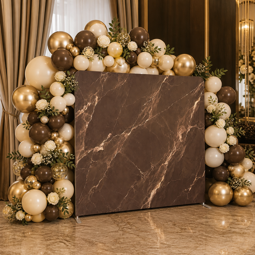 Elegant event setup with brown marble backdrop and balloon decoration
