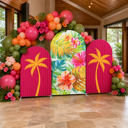 Indoor party decoration featuring tropical arch backdrop and balloons