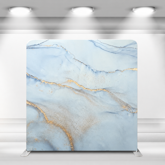 Blue marble backdrop under spotlights
