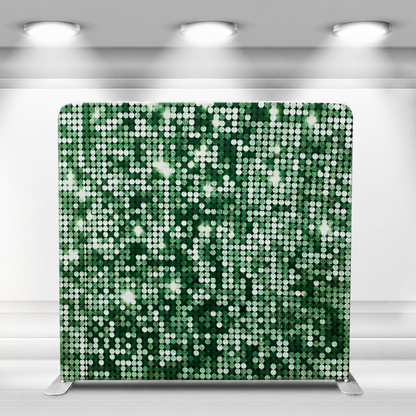Shimmering green sequin fabric backdrop with aluminum stand in a lit studio